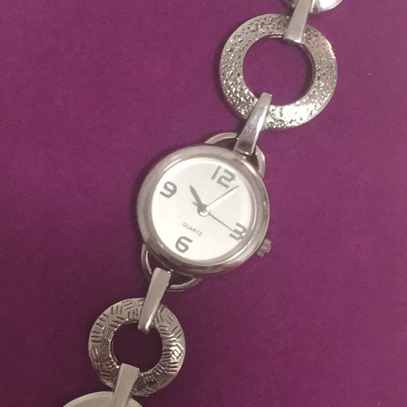 Silver toned watch. Walmart. 6 3/4 inches long. Used, like new. - Picture 2 of 5